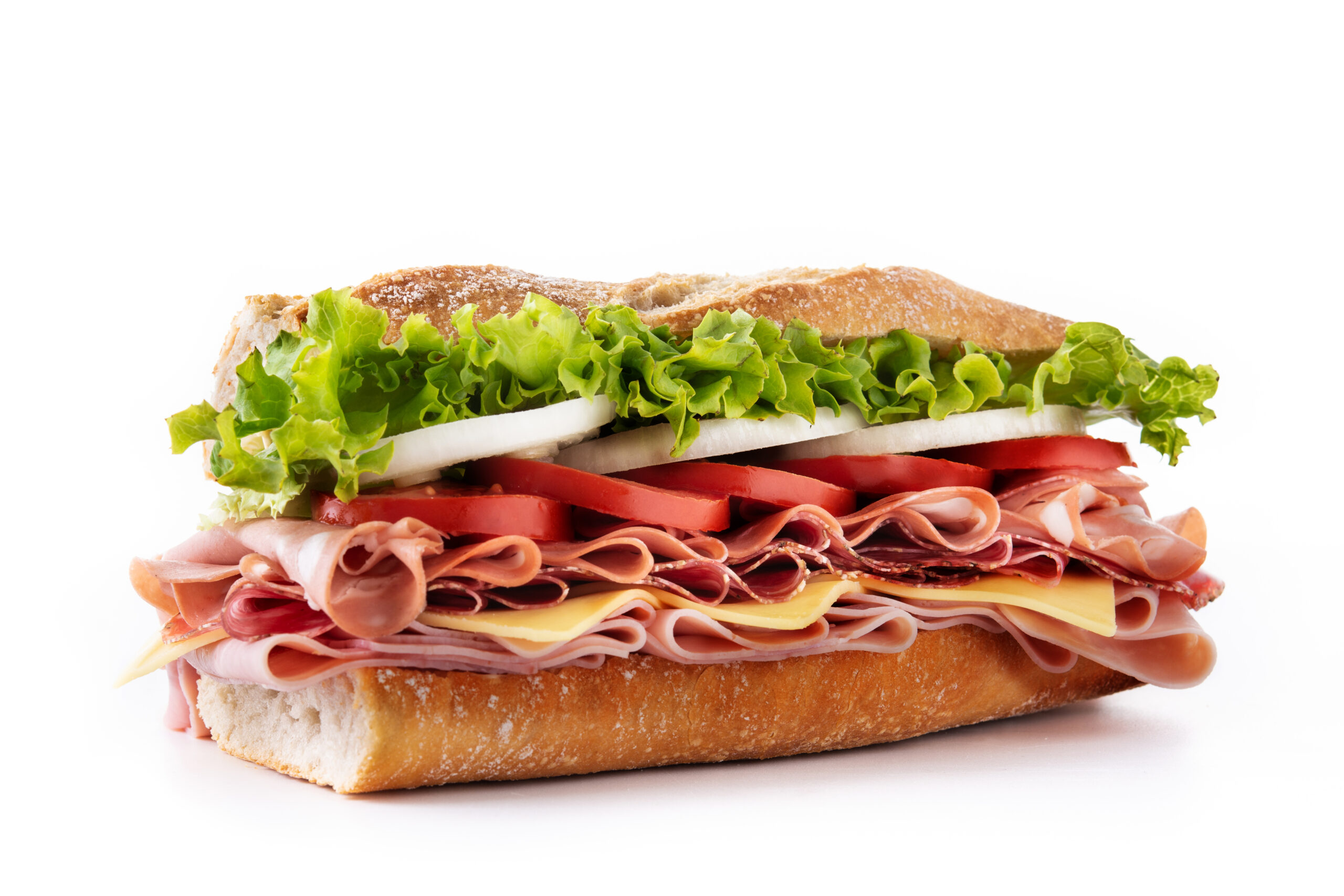 Submarine sandwich with ham, cheese, lettuce, tomatoes,onion, mortadella and sausage isolated on white background